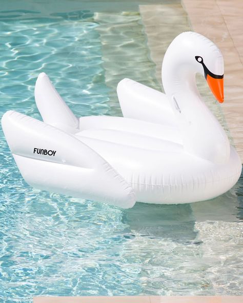 The classic white swan pool float with room for two features sleek lines and a 60'' overall size. The elegant and curved swan neck rises three feet out of the water. FUNBOY original & limited edition design Inflates in <3 minutes (w/ hair dryer (cold) or electric pump) Age 14+. Read entire owners manual prior to use. Not a lifesaving device, swimmers only. No protection against drowning. Alway ensure float is attached/tethered to a stationary object. Do not use in offshore wind or current. Do no Funboy Pool Floats, Swan Pool Float, Luxury Pool Floats, Swan Float, Cool Pool Floats, Pool Floats For Adults, Pool Rafts, Inflatable Pool Floats, Swan Neck