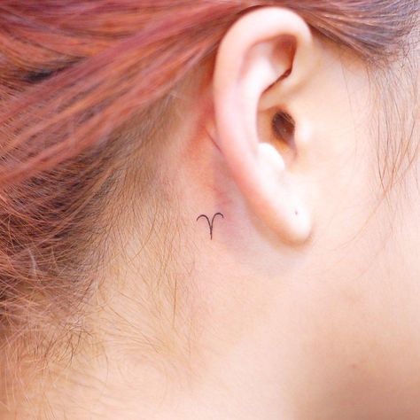 Aries tattoo by @wittybutton_tattoo Tattoos For Women Behind Ear, Aries Symbol Tattoos, Unique Tattoos Black Women, Aries Tattoos, Ear Ideas, Tattoo Behind Ear, Aries Symbol, Behind Ear Tattoos, Zodiac Sign Aries