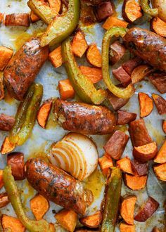 Sheet Pan Roasted Sausage with Sweet Potatoes and Peppers - get this easy dinner recipe at barefeetinthekitchen.com Sausage Sweet Potato, Roasted Sausage, Pan Cooking, Sausage Dishes, Sheet Pan Suppers, Sheet Pan Dinners Recipes, Pan Dinners, Sausage And Peppers, Spicy Sausage