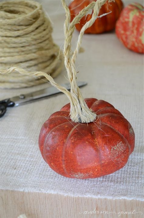 Use this tutorial to turn inexpensive plastic pumpkins into realistic looking decorations using a little paint and sisal rope!  anderson and grant Pumpkin Stems, Diy Pumpkins, Diy Pumpkin Spice, Fake Pumpkins, Pumpkin Topiary, Plastic Pumpkins, Pumpkin Stem, Velvet Pumpkins, Fall Halloween Crafts