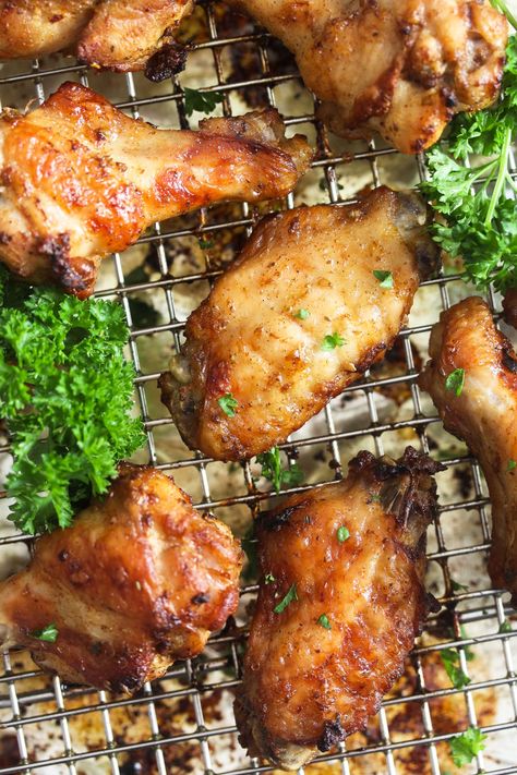 Garlic butter chicken wings, these crispy baked chicken wings make a perfect party appetizer. Ready in about 40 minutes. #thefastrecipe #garlicbutter #butterwings #garlicwings #chickenwings #gameday #footballrecipes #foodballfood #wingsappetizer #appetizers #footballappetizers #chickenrecipes #spicywings #foodrecipes #yummyfood #bestrecipes #bestchickenwings Butter Wings Recipe, Butter Garlic Wings, Baked Chicken Wings Recipes, Garlic Butter Chicken Wings, Spicy Baked Chicken Wings, Chicken Wings Recipe Oven, Butter Chicken Wings, Chicken Wings In The Oven, Baked Garlic Chicken