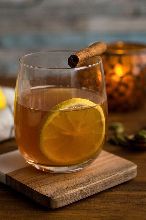 At its heart, a hot toddy is comfort in a mug—a cozy cold-weather sipper that keeps the chill at bay. In this version, chai spices like cinnamon, cloves and cardamom, along with a dash of spiced rum, give the drink even more of a warming feel. Feel free to substitute a more traditional bourbon in place of the rum and to adjust the level of tart lemon to your liking. #healthydrinks #lowsugardrinks #drinkrecipes #drinkideas #healthyrecipes Chai Hot Toddy, Hot Toddy For Colds, Cinnamon Hot Drink, Boozy Hot Tea Drinks, Hotty Toddy Drink, Chai Spices, Hot Toddies Recipe, Vegetarian Nutrition, Drinking Lemon Water