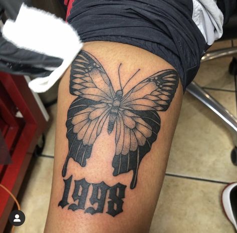 Butterfly 1998 Tattoo 🦋🦋🦋🦋 2002 Tattoo With Butterfly, Birth Year Tattoo With Butterfly, Butterfly And Year Tattoo, Upper Leg Tattoos For Women Thigh Tat Butterfly, 1960 Tattoo Number, Thigh Tattoos Butterfly, Butterfly Tattoo Men Leg, Tattoo Ideas Above Knee, Men Butterfly Tattoo