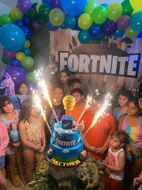 Matthew's Fortnite 9th Battle Royal | CatchMyParty.com Battle Royale Birthday Party, Fortnite Pool Party Ideas, Fortnight Party, Fortnite Birthday Party Ideas, Fortnite Birthday Party, Birthday Drip Cake, 7th Birthday Cakes, 7th Birthday Party Ideas, Laser Tag Birthday