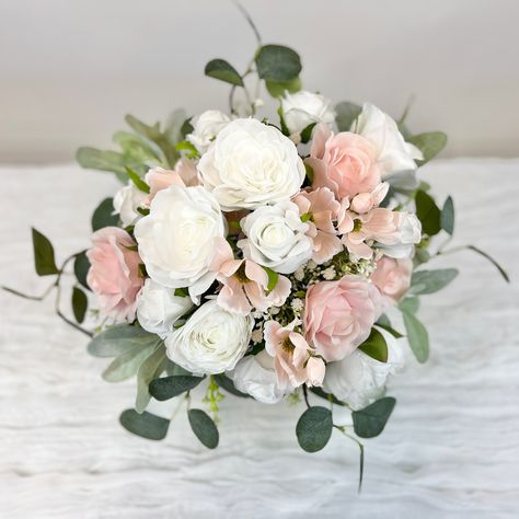 "Blush Pink and White Bridal Bouquet Collection 💕Each bouquet has blush pink cosmos and roses with realistic rose leaves - plus white babies breath and garden roses 💕Premium wedding quality artificial flowers and faux greenery including lambs ear and eucalyptus 💕3 bouquet sizes to choose from: small 9x12\", medium12x14\", large15x15\" 💕Perfect size for bride, bridesmaids & flower girls 💕Elegant blush pink and white faux florals 💕10 different satin ribbon options. Just make a note in the order personalization instructions during checkout to select your ribbon color"