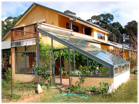 Could use the area under the deck (cement pad there) for greenhouse. Pro… Greenhouse Attached To House, Passive Solar Greenhouse, Modern Conservatory, Solar Greenhouse, Glass Greenhouse, Sustainable House, Earthship Home, Home Greenhouse, Solar Design