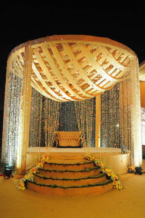 Photo of A dome-shaped mandap decorated with floral strings. Lehenga Jewellery, Indian Wedding Photos, Bridal Photos, Plan A, Jewelry Designs, Outdoor Bed, Perfect Wedding, Indian Wedding, Wedding Bridal