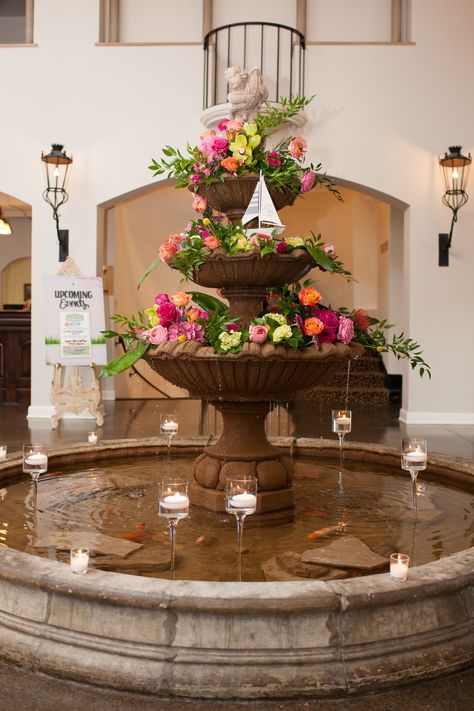 wedding fountain #weddingflorals #fountain #brightflorals Water Fountain With Flowers, Fountain Decoration Ideas, Wedding Fountain, Elegant Mexican Wedding, Classic Ballroom Wedding, Beautiful Flower Garden, Garden Party Theme, Garden Lamp, Waterfall Fountain