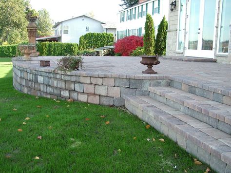 raised patio | Raised Patio with Steps | Western Interlock Raised Concrete Patio, Diy Concrete Patio, Patio Design Ideas, Cement Patio, Patio Layout, Concrete Patio Designs, Raised Patio, Concrete Patios, Patio Steps