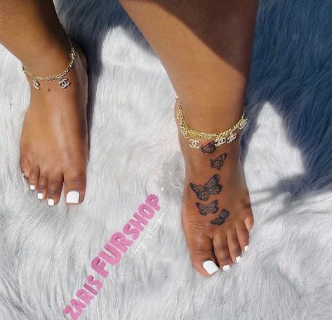 Feet Tattoos Butterfly, Butterfly Ankle Tattoo Black Women, Big Women’s Tattoos, Feet Tats For Women, Feet Butterfly Tattoo, Baddie Elephant Tattoos, Feet Tattoo Black Women, Feet Tattoos For Women Butterfly, Foot Tats Black Women