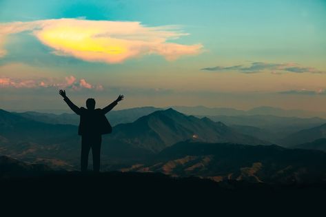 Silhouette of man on mountain top over s... | Premium Photo #Freepik #photo #mountain-top #peak #mountain-sunset #mountain Man On Top Of Mountain, Sun Light Background, Man On Mountain, Mountain Aesthetic, Mountain Sunset, Sun Light, Light Background, Iconic Photos, Mountain Top