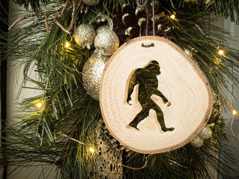 "This handmade wooden bigfoot ornament / yeti ornament / sasquatch ornament is the perfect adornment for a rustic cabin, a Christmas tree, or a Pacific Northwest home. Looking for a stocking stuffer for the cryptid lover or outdoorsy person in your life? This scroll saw ornament will delight anyone. Pick up one for your own magical Christmas tree. Will you give this fantastical beast a home? ORNAMENT DETAILS Each ornament I make is unique, as each tree and each slice of the tree is unique. The w Sasquatch Ornament, Bigfoot Ornament, Grand Fir, Recycled Christmas Tree, Woodland Christmas Tree, Recycled Christmas, Rustic Cabin Decor, Woodland Christmas, Magical Christmas