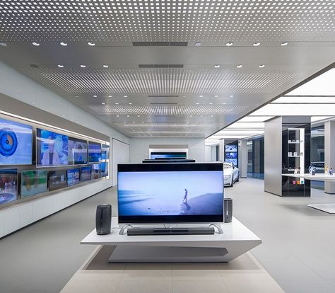 LeEco Experience Showroom using Formica® Laminate Metal Panel Ceiling, Mall Ideas, Electronic Store, Grey Floor Tiles, Showroom Display, Showroom Interior Design, Store Interiors, Electronic Shop, Products Ideas