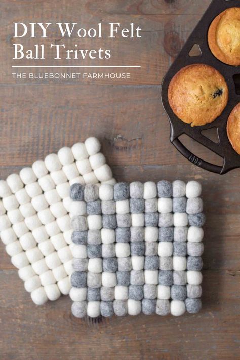 two square wool felt ball trivets on a farmhouse table with homemade blueberry muffins in a cast iron muffin pan. colors of the trivets are ivory and natural gray wool. text reads "diy wool felt ball trivets" Christmas Ornament Homemade, Cast Iron Muffin Pan, Felt Ball Crafts, Trivets Diy, Wool Felt Coasters, Diy Wool Felt, Felt Wool Ball, Wool Coasters, Diy Wool