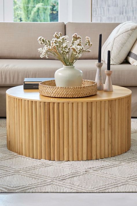 The Luca coffee table is a modernist approach to living. Made with half-moon wood panels surrounding the base, this round table offers a balance between stylised elegance and understated earthiness. Round Bamboo Coffee Table, Circular Coffee Table Styling, Circle Coffee Table Decor, Circle Coffee Table, Coffee Tables Round, Best Coffee Table, Tropical Bedroom Decor, Center Table Decor, Circle Coffee Tables