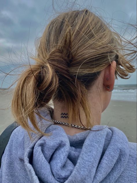 messy bun beach bright color aquarius tattoo neck tattoo back of neck tattoo Aquarius Tattoo Back Of Neck, Aquarius Neck Tattoo, Basic Tattoos, Aquarius Tattoo, Back Of Neck Tattoo, Shiva Tattoo, Tattoo Inspo, Neck Tattoo, Pretty Tattoos