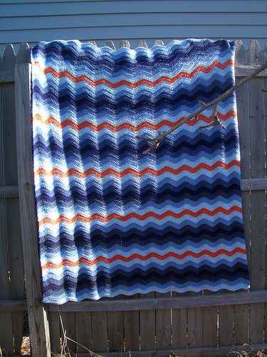 the prettiest ripple blanket I've seen by @Melissa Martensen.  I love the different tones of blue and the splash of orange. Orange And Blue Crochet Blanket, Crochet Blanket Red, Temp Blanket, Blue Crochet Blanket, Ripple Blanket, Ripple Pattern, Orange Crochet, Crocheting Ideas, Blue Crochet