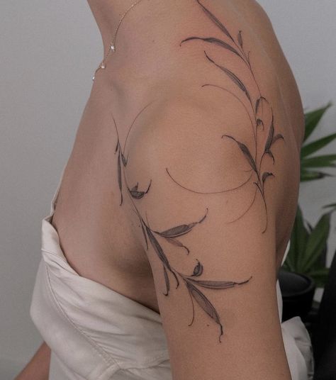 Leaf Tattoo On Back, Shoulder Foliage Tattoo, Body Framing Tattoos, Around The Shoulder Tattoo, Ethereal Tattoos Back, Wispy Tattoos For Women, Shoulder Leaf Tattoo, Fine Line Shoulder Tattoos For Women, Mid Thigh Tattoos Women