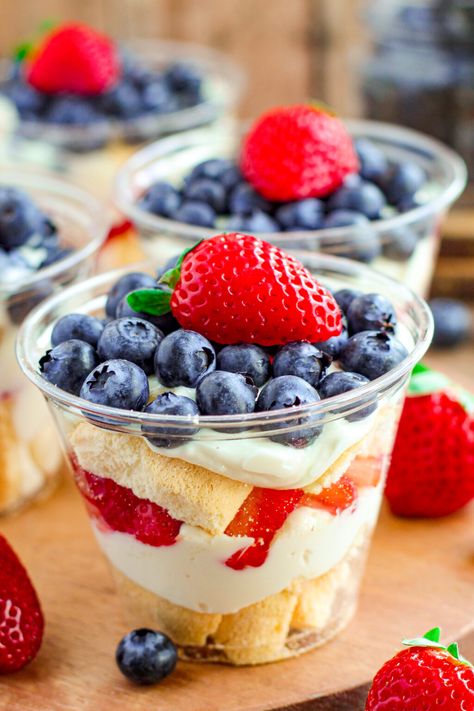 a photo of several individual trifles with blueberries and strawberries - 4th of July Trifles Berry Trifle Recipe, Crab Cakes Easy, Blueberries And Strawberries, Fruit Trifle, Dessert Cups Recipes, Berry Trifle, Mini Dessert Cups, Summertime Recipes, Trifle Desserts