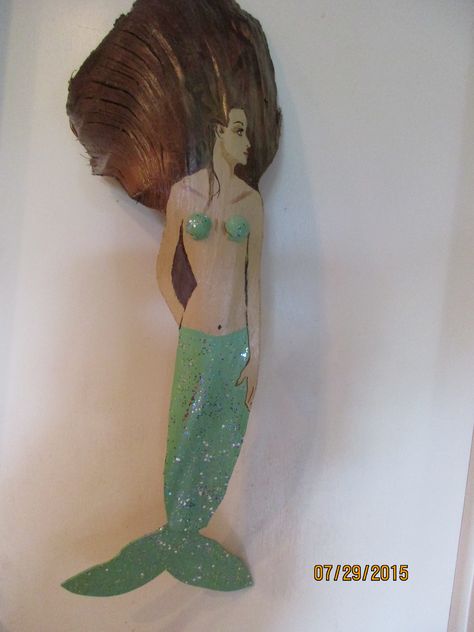 Mermaid painted on bismark palm frond Reindeer Palm Frond, Driftwood Mermaid Diy, Mermaid Palm Frond Art, Mermaid On Wood Painting, Palm Tree Crafts, Mermaid Driftwood Art, Witch Painting, Palm Frond Art, Palm Tree Art