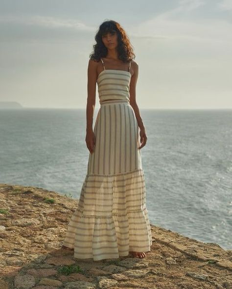 Embracing the serenity of the sea in effortless elegance.🌊✨ #SummerStyle #BeachVibes #EffortlessElegance #SunsetSilhouettes #OceanBreeze #BohoChic #CoastalFashion #Wanderlust #MaxiDress #SunsetDreams Website in bio to order 🔝🔝🔝 Linen Maxi Skirt, Elevated Fashion, Resort Wear Dresses, Linen Crop Top, Cutout Maxi Dress, Linen Crops, Tiered Maxi Skirt, Linen Maxi Dress, Fall Skirts