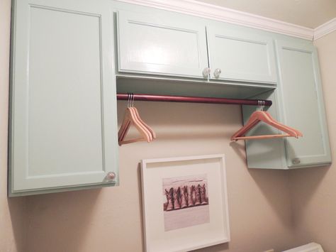 For a functional laundry room configuration, place a rod between two vertically long cabinets to create a hang-dry area for clothes above the washer/dryer Cabinets For Small Bedrooms, Aristokraft Cabinets, Modern Laundry, Room Storage Diy, Laundry Cabinets, White Laundry, Laundry Room Cabinets, Laundry Room Inspiration, Laundry Room Remodel