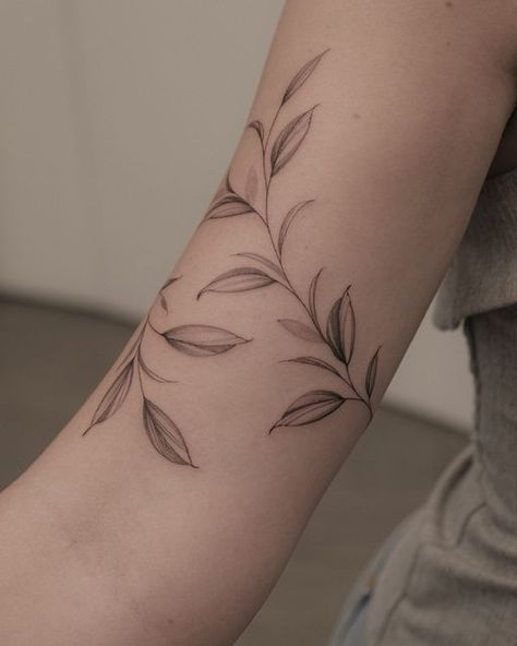 Anastasia Tattoonyc on Instagram: "Freehanded leafy wrap for Grace 🍃  #freehandtattoos #leafwraptattoo #nyctattoo #nyctattooartist #vinewraptattoo #leaftattoo #leavestattoo" Leafy Floral Sleeve Tattoo, Wrap Around Leaf Tattoo, Floral Wrap Tattoo, Olive Branch Tattoo Arm Wrap, Floral Wrap Around Tattoo Forearm, Tattoo Leaf, Botanisches Tattoo, Arm Wrap Tattoo, Leaves Tattoo