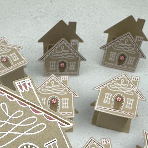 Stampin' Fancy Friday on Instagram: "From Charlet @i.heart.stamps - I love a good party favor and these tiny house boxes fit the bill. I used the Humble Home Stamp and Punch Bundle to create. Each home holds one sweet Hershey's kiss (hot cocoa flavor). I stamped the gingerbread house image in Versamark and heat set using white embossing powder. I added coloring details with Stampin' Blends and then punched it out. I created a simple box and adhered a house-punched shape to the front and back of the box. Easy, peasy!" House Shaped Gift Box Diy, Stampin Up Gingerbread House, Stampin Up Humble Home, Humble Home Stampin Up Cards, Humble Home, Christmas Treats Boxes, Stampin Blends, Fancy Friday, House Image