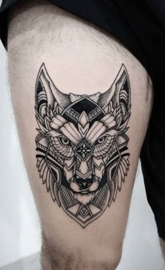 Wolf Tattoos - What's their Meaning? PLUS Ideas & Photos Wolve Tattoo Men, Men Tattoo Ideas Wolf, Maori Wolf Tattoo, Native American Wolf Tattoos For Men, Mexican Wolf Tattoo, Celtic Wolf Tattoo Design, Celtic Wolf Tattoos For Men, Aztec Wolf Tattoo, Wolf Tattoo Design Men Chest