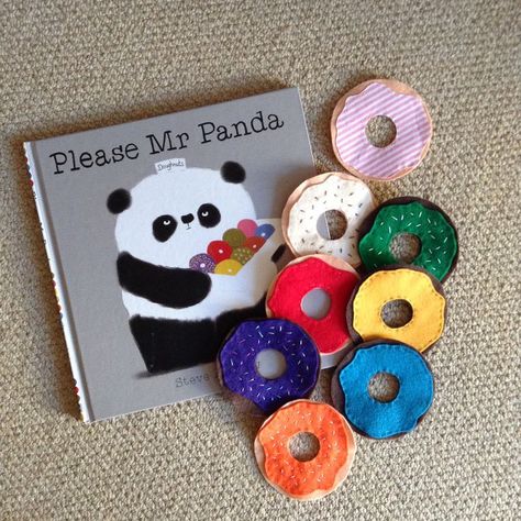 Please Mr Panda story sack doughnuts (also make great threading game as well as props for counting and colour recognition). Preschool Stories With Props, Diy Story Sacks, Story Book Project Ideas, Story Props Preschool, Please Mr Panda Activities, Story Baskets For Preschool, Story Baskets For Toddlers, Story Sack Ideas, Please Mr Panda