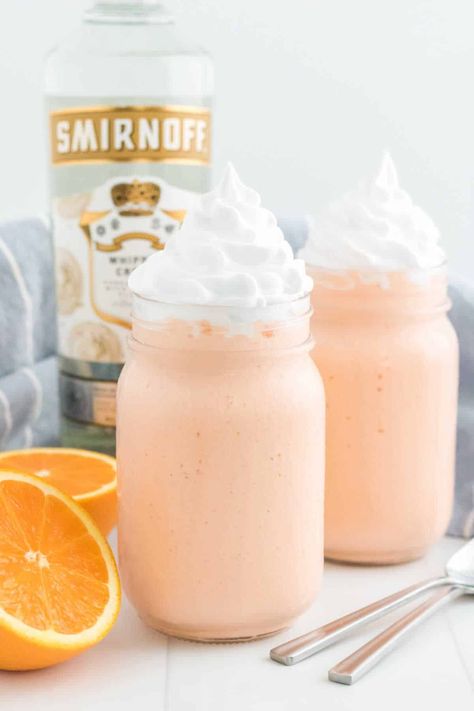 Best Boozy Orange Creamsicle Milkshake - Simply Stacie Creamsicle Milkshake Recipe, Whipped Vodka Drinks, Orange Creamsicle Milkshake, Orange Creamsicle Drink, Creamsicle Milkshake, Creamsicle Drink, Vodka Recipes Drinks, Whipped Vodka, Orange Ice Cream