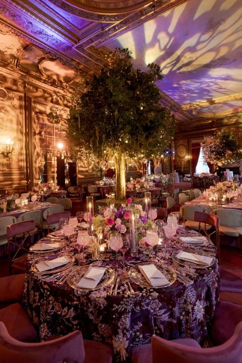 A magical reception table featuring lush florals, moody lighting, and intricate detailing for an unforgettable event. Purple Reception, Moody Lighting, Reception Table, Wedding Reception Decorations, Reception Decorations, Event Planning, Wedding Reception, Lush, Wedding Venues