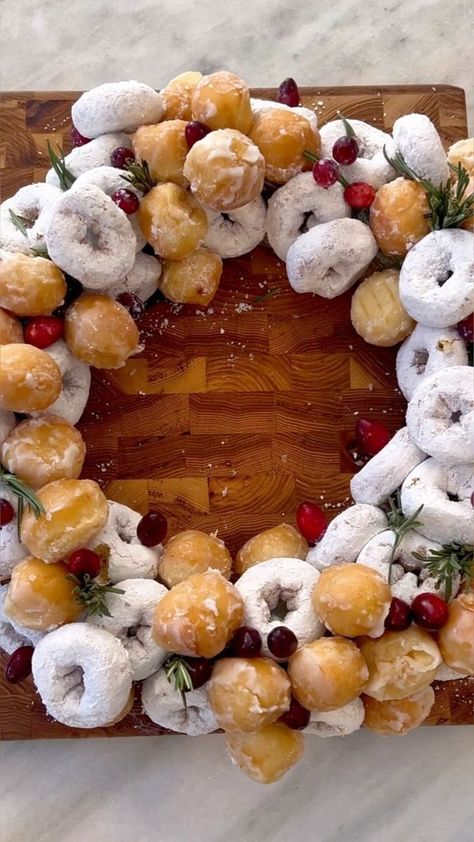 2.5M views · 2.8K shares | How cute is this donut wreath for Christmas morning? It's also a beautiful centerpiece! 3 dozen donut holes from my local donut shop 2 bags of mini powdered donuts Cranberries and rosemary! Share with a friend 🎄 | Mackenzie Biehl | Forrest Frank · Deck The Halls Donut Wreath, Christmas Brunch Party, Christmas Party Treats, Dozen Donuts, Wreath For Christmas, Christmas Donuts, Powdered Donuts, Donut Holes, Christmas Brunch