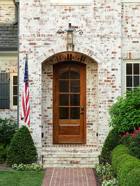 White Distressed Brick House, Light German Smear Brick Exterior, Whitewash Vs German Smear, Red Brick And Limestone Exterior, German Schmear Brick House, Lime Wash On Red Brick, German Schmear Brick Exterior, White Wash Red Brick Exterior, Lime Wash Brown Brick