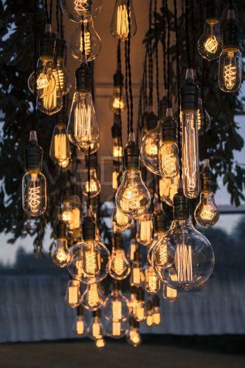 industrial warehouse wedding luxe up a warehouse wedding Vintage Bulb Chandelier, Warehouse Wedding Decorations, Edison Bulb Wedding, Bus Boutique, Ginger Wedding, Raven Wedding, Edison Bulb Chandelier, Modern Summer Wedding, Industrial Luxe