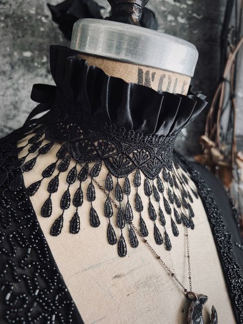 "\"If there ever comes a day where we can't be together, keep me in your heart. I'll stay there forever.\" ~ A.A. Milne ~ choker made from teardrop lace in the deepest shade of black ~ perfect necklace for an alternative or gothic wedding ~ piece measures 14.5\" {11.42cm} wide ~ gothic collar closes with satin ribbon ties ~ features satin pleated trim along top edge ~ made-to-order: please measure your neck circumference, and choose your size from the drop down menu. if you are in-between sizes, Goth Wedding Jewelry, Black Gothic Jewelry, Macabre Fashion, Vampire Fashion, Fantasy Clothes, Black Lace Choker, Lace Choker Necklace, Fashion Illustrations Techniques, San Angelo