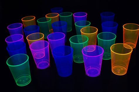 PRICES MAY VARY. 100 tall bodied blacklight reactive 10 ounce cups per set Ideal for glow parties, birthdays, holidays, festivals, themed events and so much more! Cups are disposable, but can be carefully hand washed for multiple uses Each set of cups purchased includes 5 free blacklight balloons Blacklight responsive ONLY. Cups do NOT glow without a blacklight Our tall 10oz disposable neon blacklight cups are a must have for any glow party using blacklight. Hard plastic has some flex to withsta Mini Bar Decor, Glow Birthday Party Ideas, Glow Pool Party, School Dance Decorations, Glow Pool Parties, Cup Pong, 21st Birthday Party Themes, 90s Theme Party Decorations, Polaroid Guest Book Sign