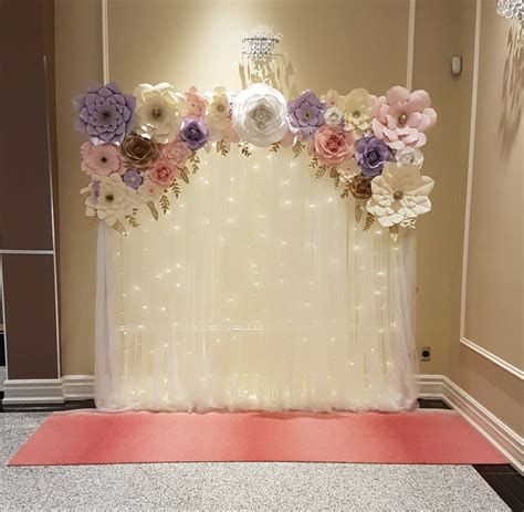 Giant Paper Flowers Diy Baby Shower Decorations Pink Fairy Lights Backdrop Wedding, Pink And Purple Backdrop, Backdrop With Fairy Lights, Fairy Lights Ideas, Flower Wedding Backdrop, Wedding Backdrop Ideas, Bridal Shower Decorations Pink, Paper Flower Backdrop Wedding, Flower Wall Rental