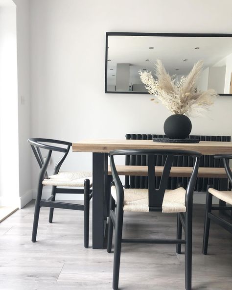 Black Grey Neutral Living Room, Black And Beige Dining Table, Black And Beige Kitchen Table, Clean Aesthetic Dining Room, Monochrome Wood Interior, Dining Room Monochrome, Dining Table Black Decor, Dining Room Vibes, Radiator In Dining Room