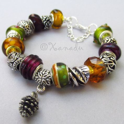 Autumn Leaves European Charm Bracelet With Silver Pine Cone Pandora Bracelet Ideas, Pine Cone Jewelry, Trollbeads Bracelet, Autumn Bracelet, Cowgirl Bling, Charms Bracelets, Gold Charm Bracelet, Coloured Glass, Bracelet Ideas