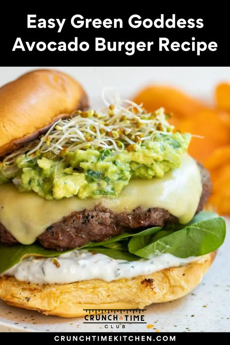 Green Goddess Burger. The ultimate burger recipe for summer! Think of a juicy burger patty topped with guacamole, sprouts, greens, and a homemade herb yogurt sauce. This avocado burger is perfect for BBQs. The easiest make-ahead homemade ground beef patties and delicious green toppings with a creamy sauce. #Hamburgers #GreenGoddess #Avocado Olive Burger Recipe, Herb Yogurt Sauce, Hamburger Recipes Easy, Homemade Ground Beef, Ground Beef Patties, Avocado Burger, Burger Mix, Ultimate Burger, Juicy Burger