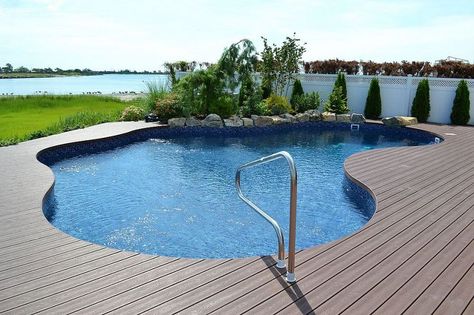 Considering the beautiful vistas open to this home, maximizing views was an important factor in every part of our design. www.deckandpatio.com Solar Pool Heater Diy, Decks Around Pools, Trex Decking, Pool Decking, Wood Decking, Deck And Patio, Plastic Lumber, Vinyl Pool, Solar Pool