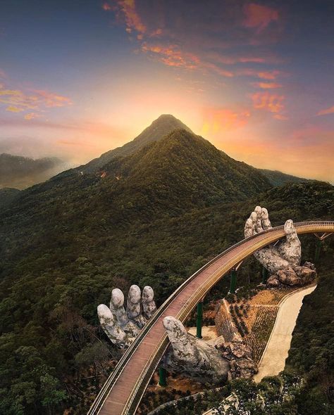 Nestled just outside of the city of Da Nang, Vietnam’s #GoldenBridge may be the world’s most unique footbridge. It connects the nearby cable car station to the beautiful gardens of the Bà Nà Hills Resort. Set against a backdrop of lush, fantastical scenery, the #bridge rises from the ground, supported by two giant hands.