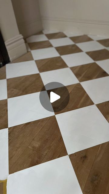 Katie Rowe on Instagram: "DIY TUTORIAL 🔸Checkerboard / Harlequin Floor 🔸  So much love on my stories for this project so here’s how I did it!   What you’ll need :   	•	Tape measure/ruler 	•	Pencil 	•	Card or foam board for template 	•	Laser level 	•	High-quality tape (Try @frogtapeuk ) 	•	Craft blade 	•	Paint brush/small roller 	•	Floor paint (I used @makeitrustoleum)  Prep: Ensure floors are clean and previous finishes are sanded, especially with gloss or varnish. Ours are bare wood as I sanded them the other year.  How to :   * Create a template (e.g., 30cm x 30cm). * Begin at a central focal point. I used our fireplace as it’s actually slightly off centre and I wanted the pattern to be symmetrical here. * You will be starting by masking out the diamonds that will be PAINTED. So keep t Marble And Wood Checkered Floor, Painted Chequerboard Floor, Checkerboard Floor Bathroom, Harlequin Floors, Wood Floor Pattern, Checkerboard Floor, Floor Paint, Carpet Squares, Harlequin Pattern