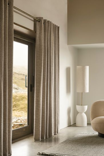 In a textured cosy fabric, these curtains are the perfect addition to any room in your house. The heavyweight fabric drapes beautifully and feels tactile and cosy. Simple silver brushed eyelets make them easy to pair with your existing or chosen curtain pole. The standard lightweight lining adds an extra layer to the back of curtains to provide added durability and to help prevent fading over time. Or, beat the chill and keep your home warm and cosy with our super thermal lining. For top tips on Beige Curtains Bedroom, Lounge Curtains, Natural Curtains, Cream Curtains, Beige Curtains, Beige Living Rooms, Minimalist House, Eyelet Curtains, Curtain Pole