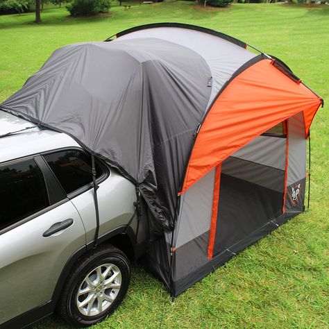 Universal-Fit Car Tent: Camp without leaving all the luxuries of home behind; This tailgate tent features an adjustable vehicle sleeve that can be attached to the back of any size SUV with or without a roof rack Intuitive Features: This outdoor tent comes equipped with 2 gear pockets for small personal items, an overhead lantern hook, glow-in-the-dark zipper pulls, and a water-resistant PE bathtub floor — no ground tarp required Family Size: This large tent comfortably sleeps 4 adults, while the Bil Camping, Suv Tent, Zelt Camping, Auto Camping, Suv Camping, Camping Diy, Tent Campers, Camping Shower, Camping Guide