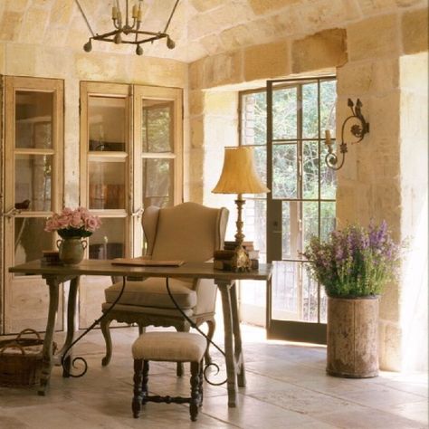 Reclaimed stone on walls and floor of charming Old World French country office of Ruth Gay (Chateau Domingue). #frenchcountry #interiordesign #limestone #rusticdecor #frenchfarmhouse #chateaudomingue #frenchhouse European Farmhouse Living Room, Rustic European, Country Style Interiors, French Farmhouse Style, French Farmhouse Decor, Farmhouse Interior Design, French Country Kitchens, French Country Living Room, Country Interior