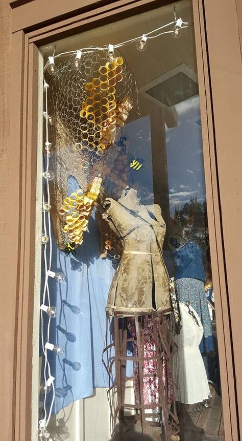 Honeycomb window display using chicken wire and paper at the Silver Treadle. Hanging Bees From Ceiling, Chicken Wire Bee Hive, Honeycomb Window, Salon Window, Vintage Market Booth, Kingdom Vbs, Bee Craft, Insect Unit, Beehive Design