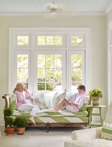 mother-son-sitting-green-couch-sunroom-103322744 Georgian Revival Homes, White Sitting Room, Sarah Bartholomew, Ornate Chairs, Green Dining Chairs, Green Couch, Daybed Covers, All White Kitchen, Relaxing Bedroom