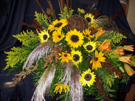 Casket spray made for a man who loved sunflowers, and cattails. Casket Spray, Casket Flowers, Beaumont Texas, Blue Flower Vase, Wild Sunflower, Flowers For Men, Simple Home Decoration, Casket Sprays, Grave Decorations